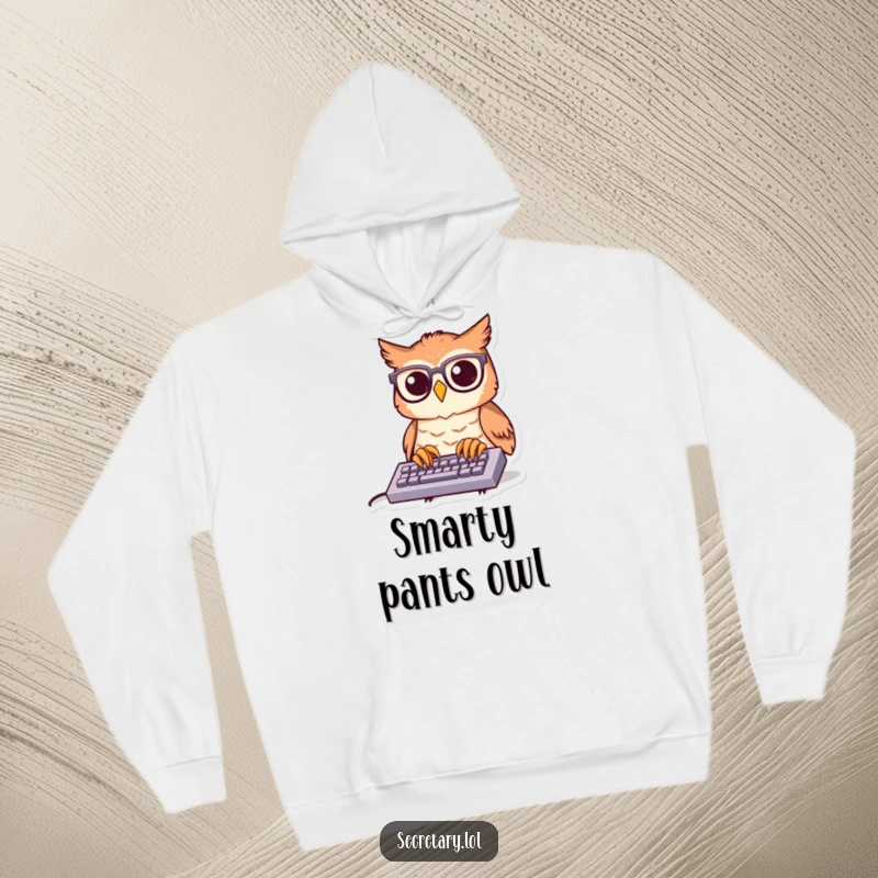 Funny owl with tiny spectacles typing fast on a small keyboard, depicted on a cozy hoodie for a humorous vibe.