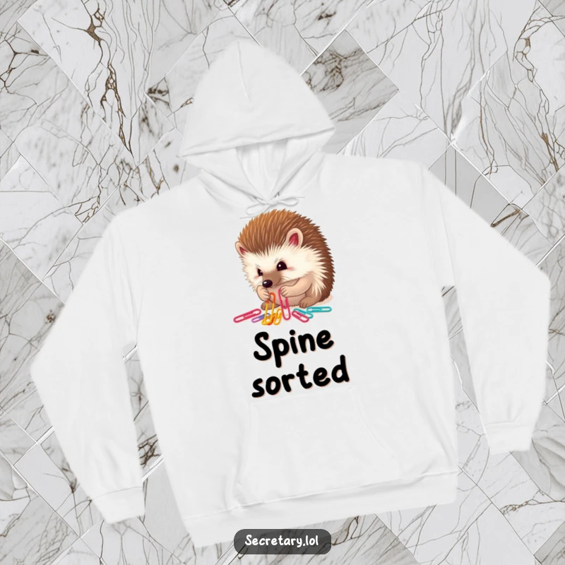 Funny determined hedgehog sorting colorful paper clips with tiny paws, ideal for hoodies.